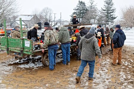 GEORGETOWN, PENNSYLVANIA - March 2, 2019: Amish volunteers help at the annual Bart Township mud sale which benefits the Fire Company.のeditorial素材