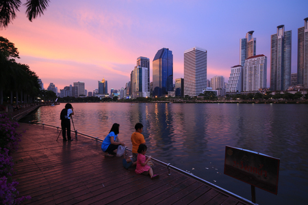 BANGKOK , THAILAND - May 04: Benjakiiti" public park, lake view with city on twilight May 04, 2015 at Bangkok, Thailand.のeditorial素材