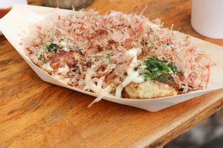 Takoyaki, Japanese octopus ball on wood plateの写真素材