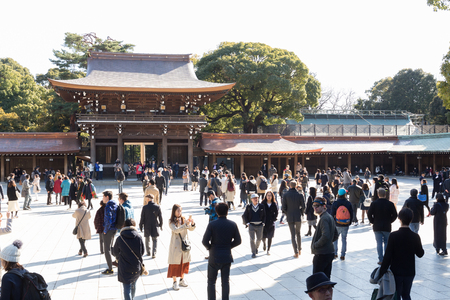TOKYO, JAPAN - FEBRUARY 19: a lot of tourists go to make merit at Meiji Jingu Shrine February 19, 2017 in Tokyo, Japanのeditorial素材
