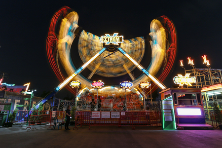 BANGKOK, THAILAND - APRIL 28: Abstract blurry light long exposure swing player name Extreme in amusement park April 28, 2016 at Bangkok, Thailand.のeditorial素材