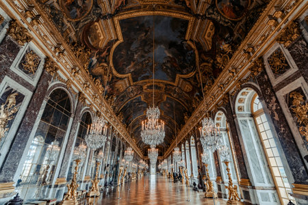 VERSAILLES, FRANCE - May 20 2022: The Hall of Mirrors (Galerie des Glaces) of the Royal Palace of Versailles in France. The Royal Palace of Versailles is on the UNESCO World Heritage List.のeditorial素材