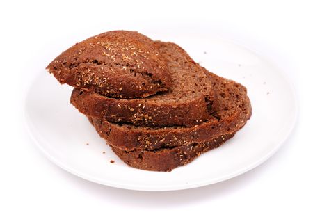 Rye bread on white plate