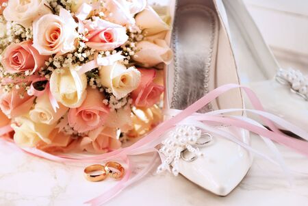 Wedding rings and bouquetの写真素材