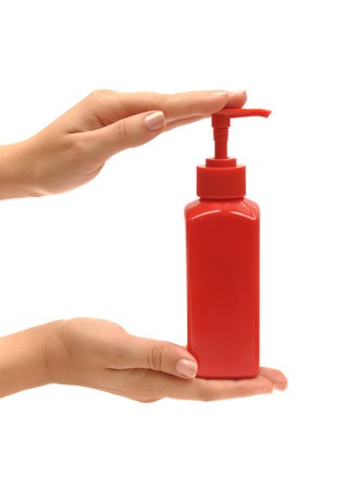 Hands holding cream or soap. Hand care.の写真素材