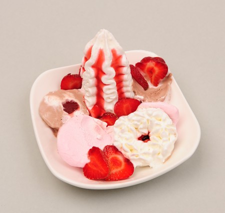 Ice cream in bowl with strawberryの写真素材