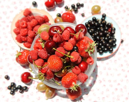 Assorted summer berries, outdoor shot.