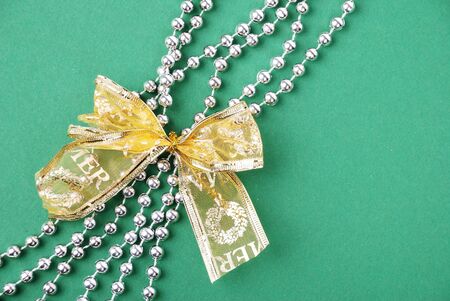 New Year's decoration with bow on green