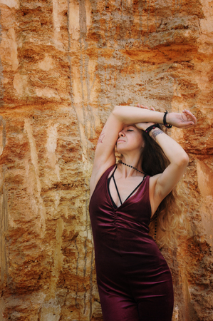 Young fashion woman portrait, closed eyes, outdoorsの写真素材