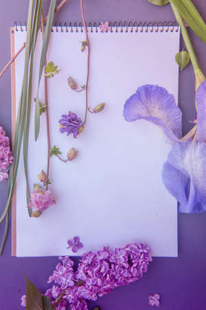 Empty space white vertical list mockup with various spring flowers, floral mockupの写真素材