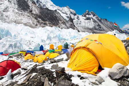 Bright yellow tents in Mount Everest base camp, Khumbu glacier and mountains, sagarmatha national park, trek to Everest base camp - Nepal Himalayasの写真素材