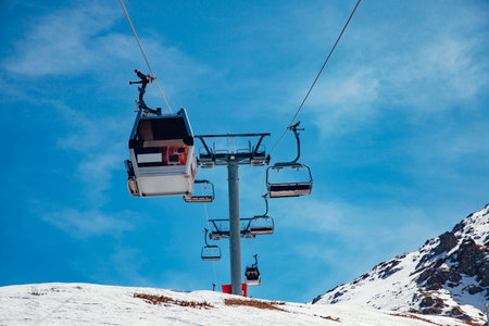 Cable car in the beautiful winter snow mountainsの写真素材