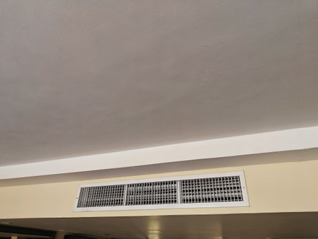 Ceiling vent is installed in a neutral-colored room, contributing to air circulation and comfort in...