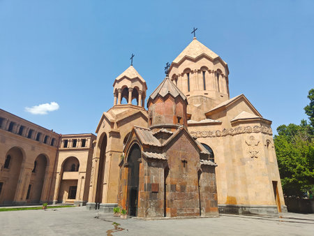 Ancient church in Yerevan, Armenia, with iconic Armenian architecture under a clear blue sky on a sunny day.の写真素材