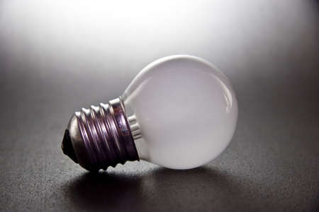 white off bulb on the dark backgroundの写真素材