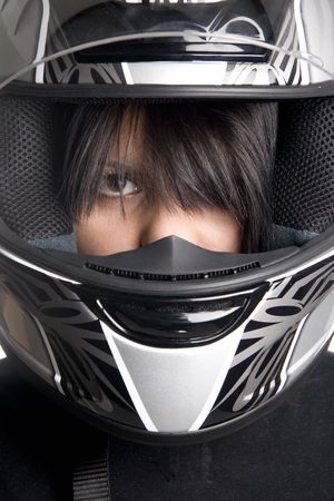 young attractive woman in big motorcycle helmet