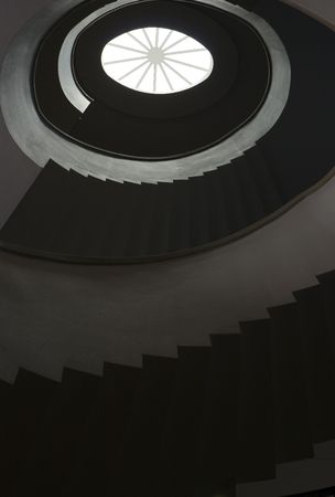 Spiral staircase  / A spiral staircase leading upの写真素材