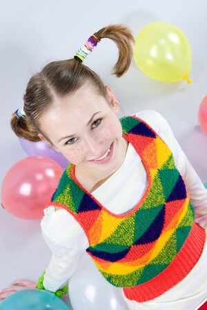 The pretty smiling girl with the balloons の写真素材