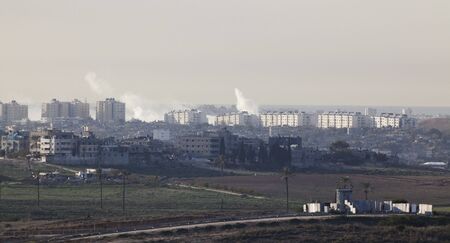 Israeli  Palestinian conflict. Israeli military operation Cast Lead. Smoke in Gaza city after the Israeli army air strike 15/01/2009の写真素材