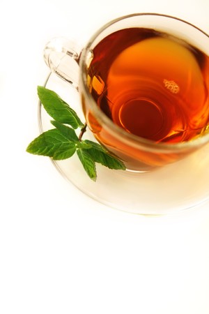 cup of tea with mint leaf on white backgroundの写真素材