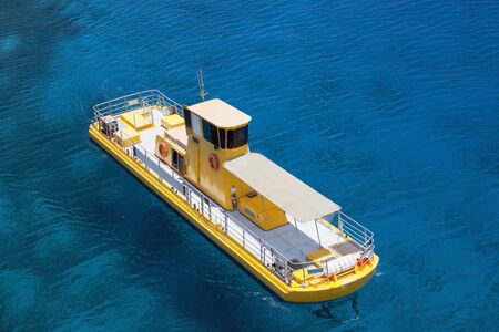The south of Israel Eilat city a yellow boat in the sea