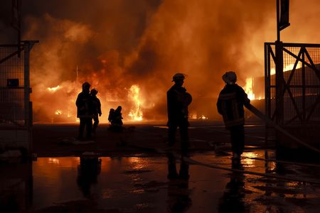 Silhouette of firefightersの写真素材