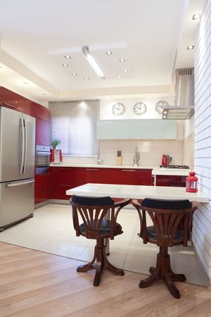Luxury kitchen with red and marble elementsの写真素材