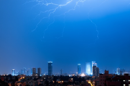 Panorama of the Tel Aviv with lightning over a cityの写真素材