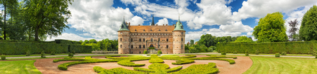 Panorama Of Egeskov Castle, located in the south of the island of Funen, Denmark. Vintage look.のeditorial素材