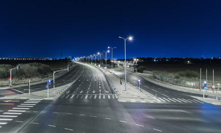 Empty freeway at night - Blue color toned
