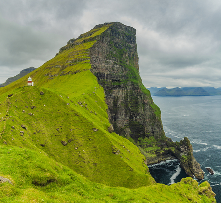 Shot Of Beautiful Panoramic Scene, Kalsoy Island and Kallur lighthouse, Faroe Islandsの写真素材