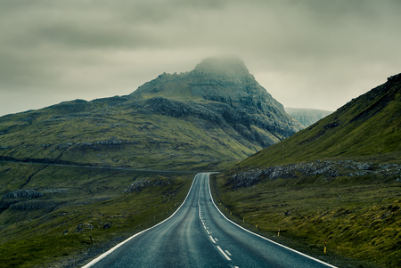 A long straight Country Road, Faroe Islandsの写真素材