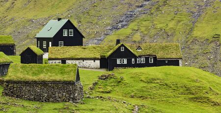 Old Saksun village, With  traditional Scandinavian type of green roof,  Located On The Faroe Islands, Denmarkの写真素材
