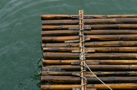Landscape views on the Raft Bamboo Floating in the water texture background.の写真素材
