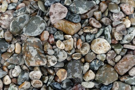 Bright and colorful river stonesの写真素材