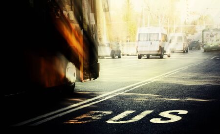 bus trafic in downtoun Sofia, Bulgaria; blured cityscape backgroundの写真素材