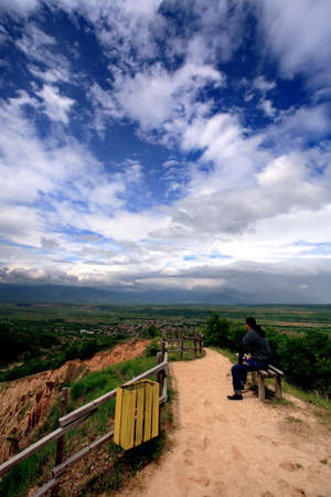 man see beautiful sky landscape in bulgarian high mountainの写真素材