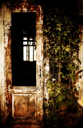 abandoned spooky front door; vintage textured old houseの写真素材