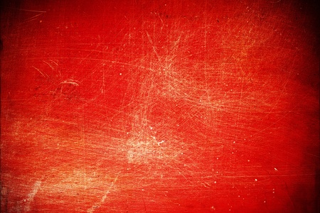 vintage scrached red texture for design or backgroundの写真素材