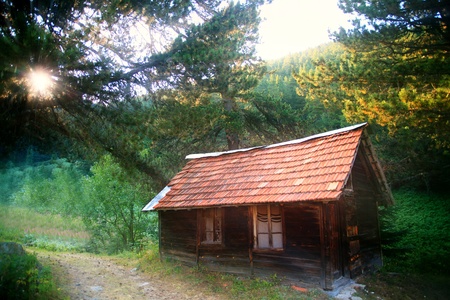 HDR sunset over the old wooden house in bulgarian Pirin mountain のeditorial素材