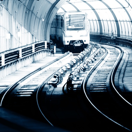 urban metro station with leaving train- duotone industrial cityscape の写真素材