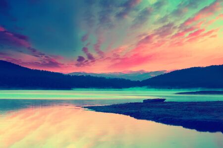 morning on the lake, fantasy infrared filtered imageの写真素材