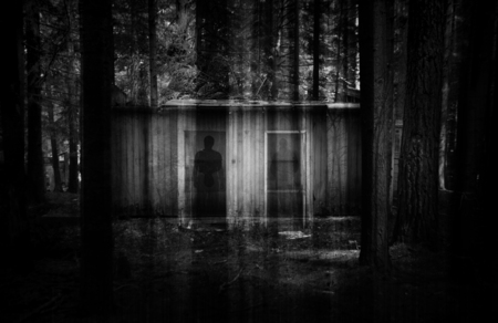 abstract double exposured horror background with ruins in dark forest and ghostly shadows. Some noise added for stronger horror effectの写真素材