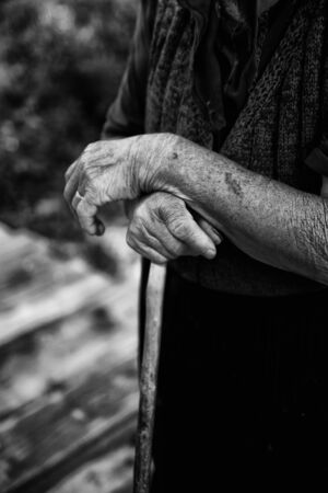 old woman hand close-up in black and whiteの写真素材