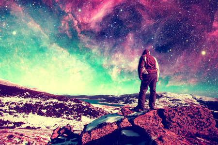 Follow your dreams, silhouette of man and many starsの写真素材