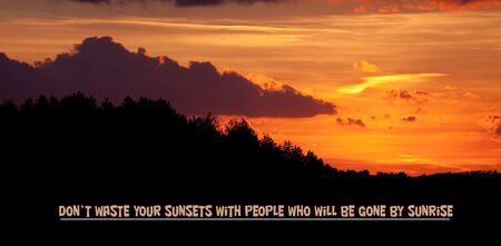 unknown love quote background, red sunset in the mountains backgroundの写真素材