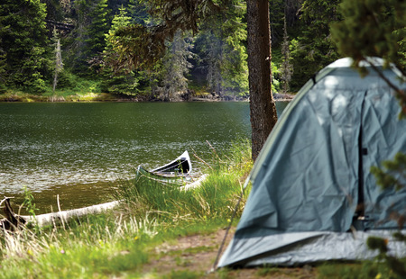 tent and canoe in high mountain  bulgarian Beglika lakeの写真素材
