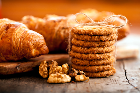 Close up delicious cookies and nuts, macro food backgroundの写真素材