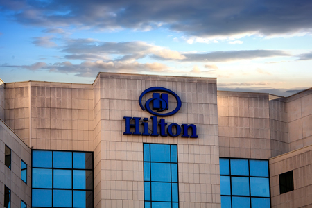 SOFIA, BULGARIA - NOVEMBER 02, 2017: Hilton hotels and resorts logo on the building, sunset timeのeditorial素材