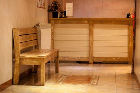 Indoor wooden bench in hotel spa centerの写真素材